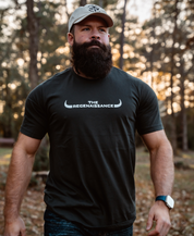 A bearded man wearing a Farm Fresh Clothing MMRA Trinity Cap embraces the spirit of food freedom.