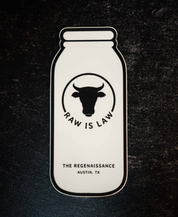 The Regenaissance Sticker Pack by Sticker Mule features a vinyl sticker shaped like a milk bottle with a cow head, RAW IS LAW, and THE REGENAISSANCE, AUSTIN, TX—celebrating real food and regenerative agriculture.