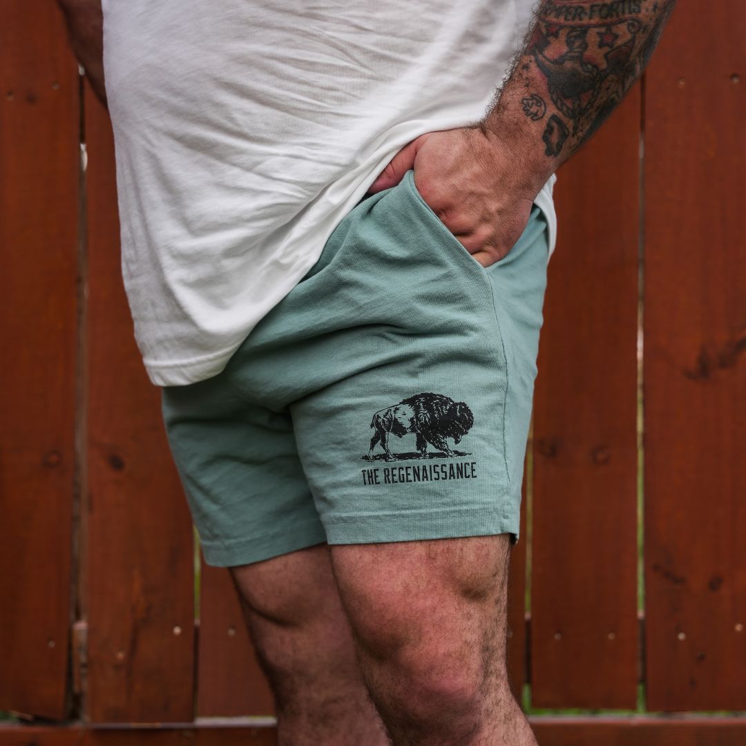 Close-up of atlantic-green Regen Men’s Shorts fabric texture and reinforced seams for durability and comfort.