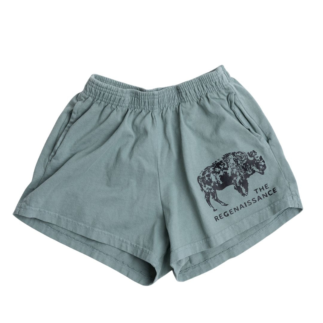 Atlantic Green Women's Bison Shorts by Los Angeles Apparel feature an elastic waistband, side pockets, and a black buffalo graphic above THE REGENAISSANCE—celebrating regenerative agriculture—on the front left leg.